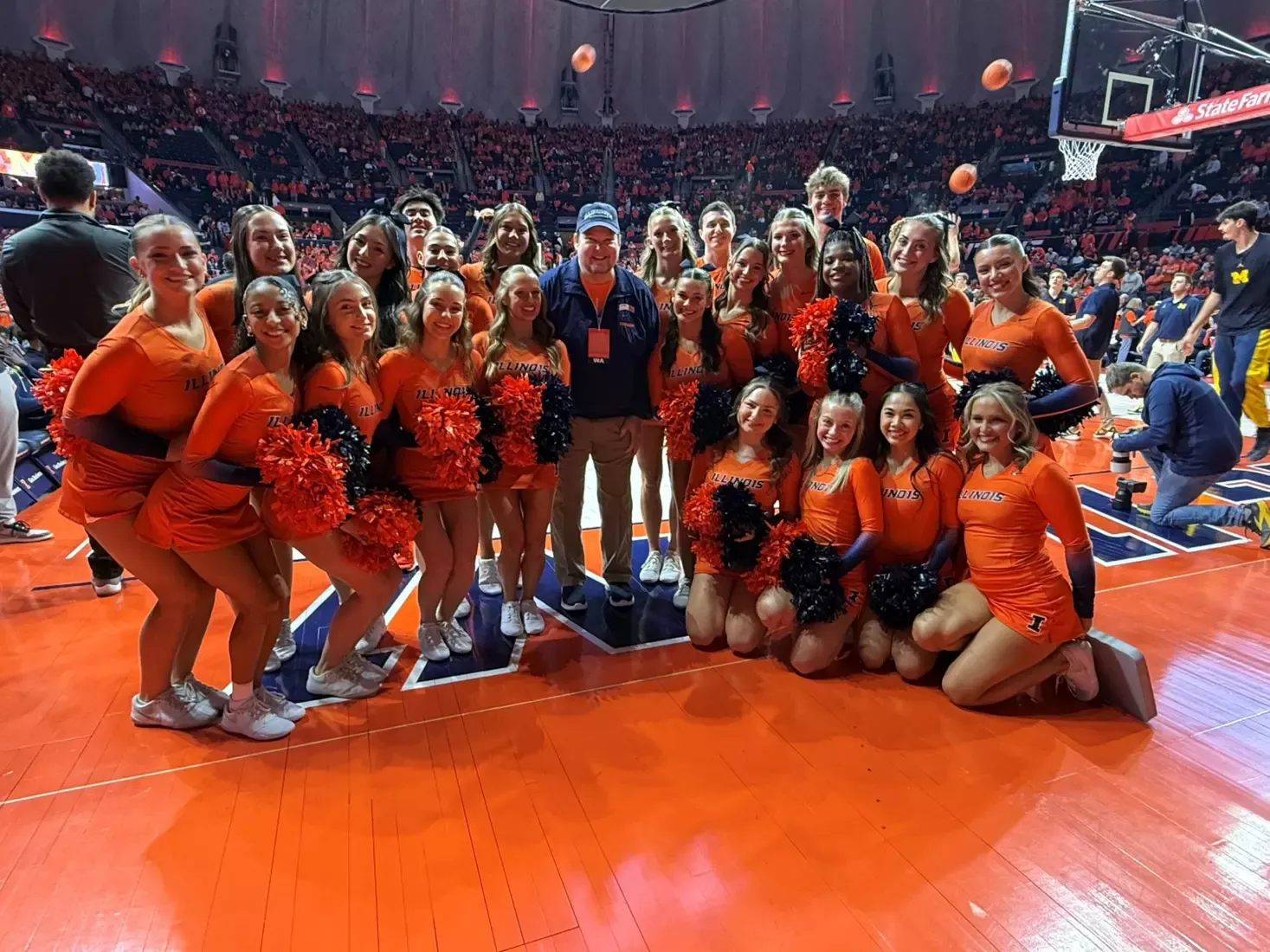 David Mizer and Illini cheerleaders at State Farm Center.